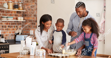 Happy family cooking together