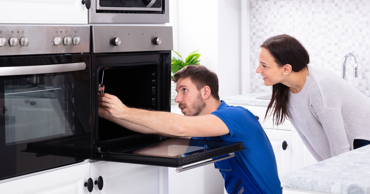 Man fixing a stove